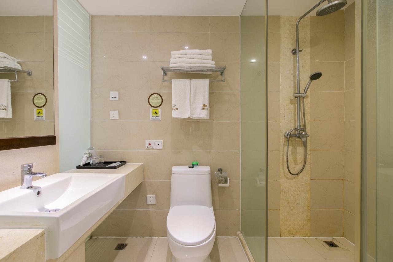 Aparthotel Sanya Sun And Sea Gueshouse Esterno foto