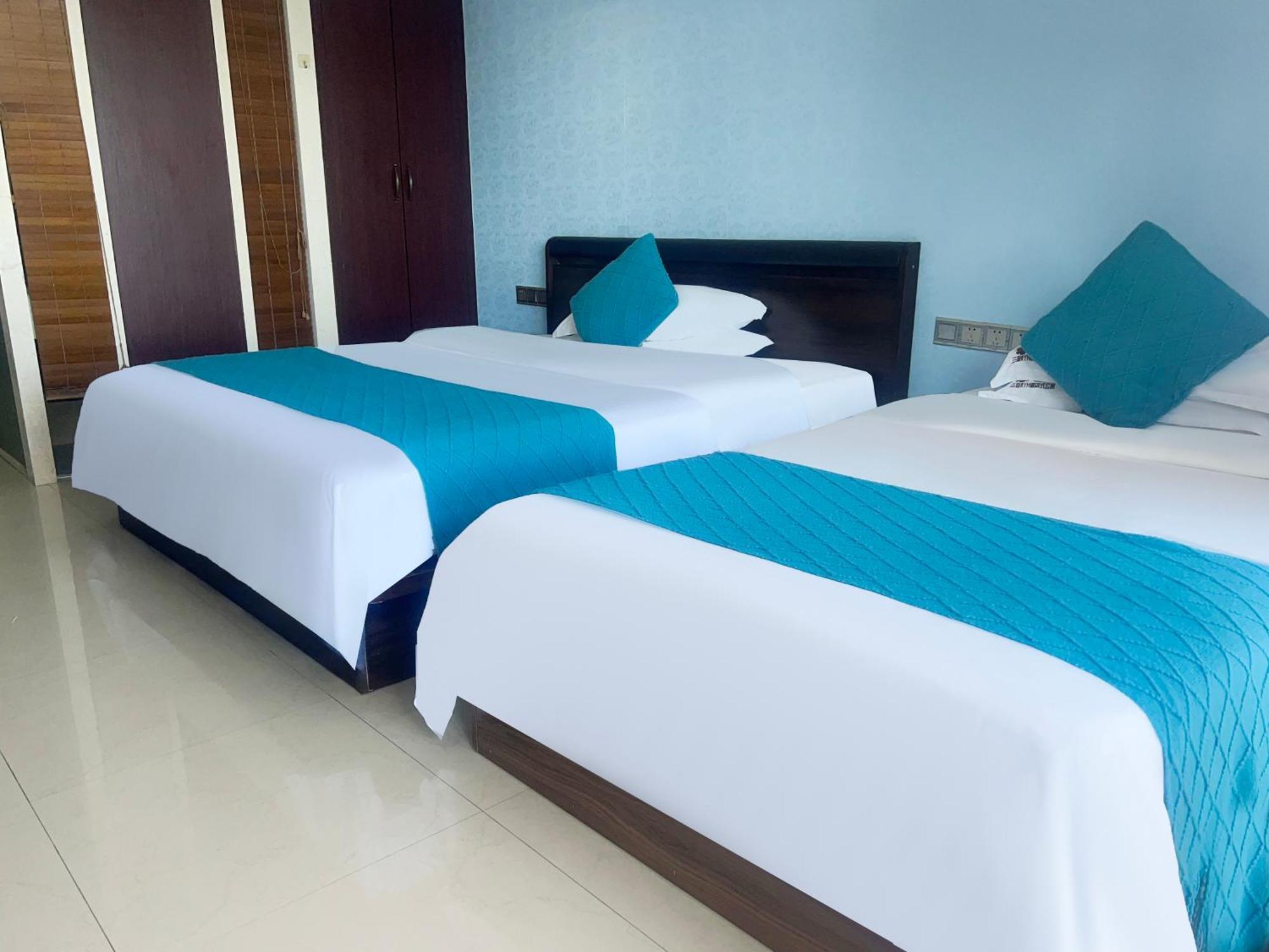 Aparthotel Sanya Sun And Sea Gueshouse Esterno foto