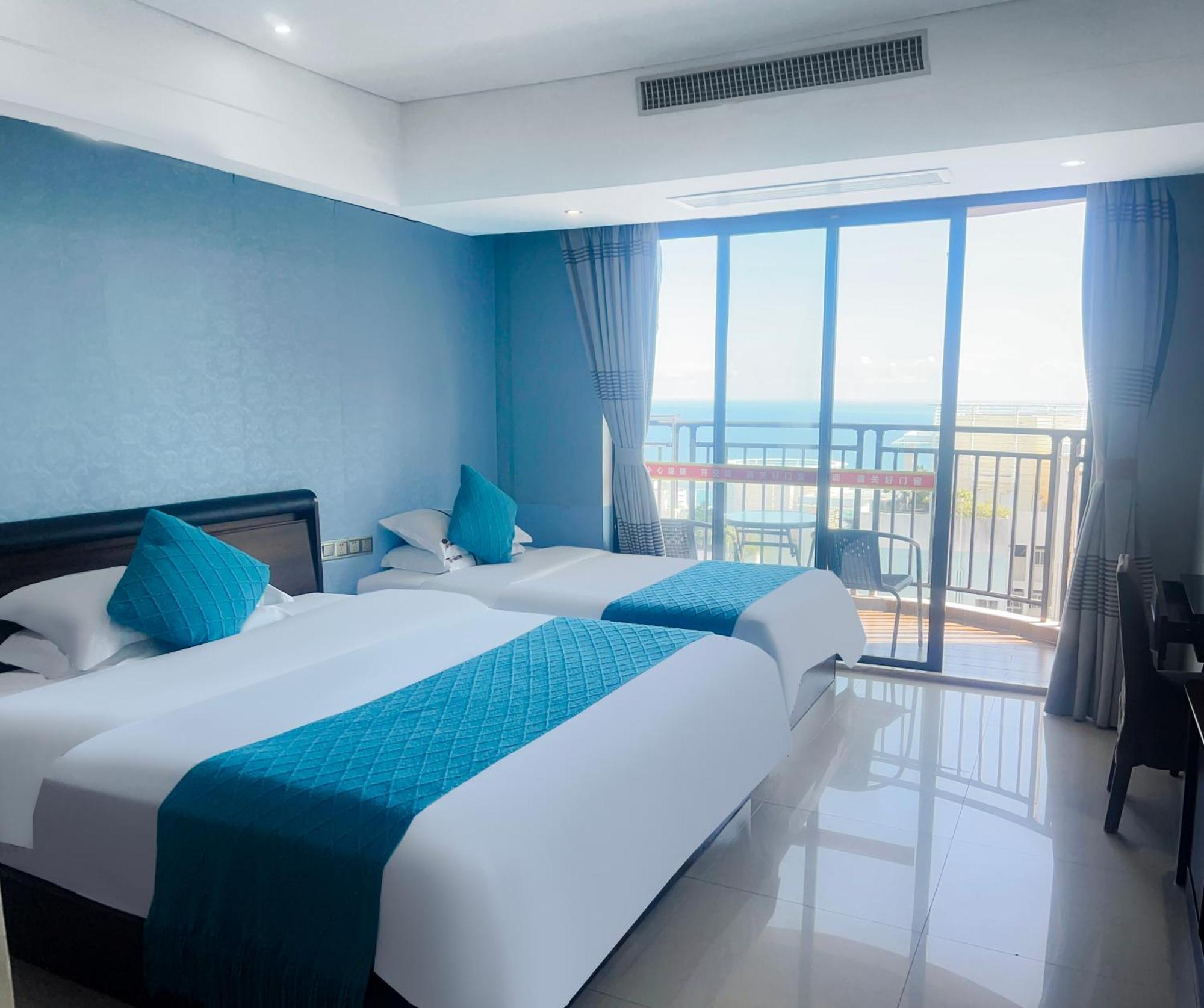 Aparthotel Sanya Sun And Sea Gueshouse Esterno foto