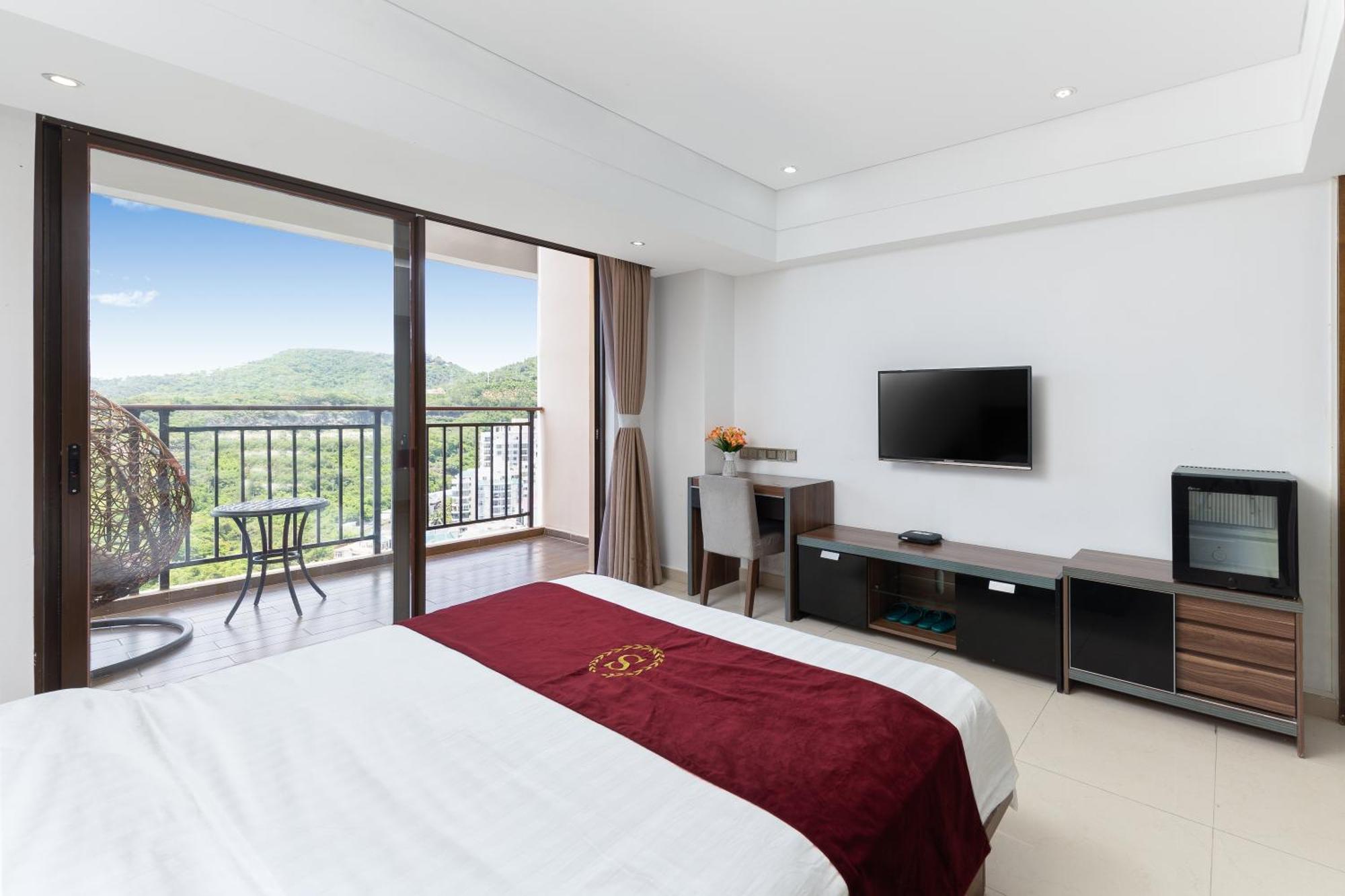 Aparthotel Sanya Sun And Sea Gueshouse Esterno foto