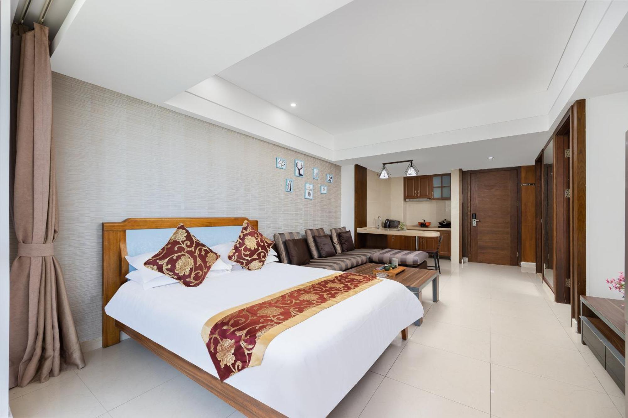 Aparthotel Sanya Sun And Sea Gueshouse Esterno foto