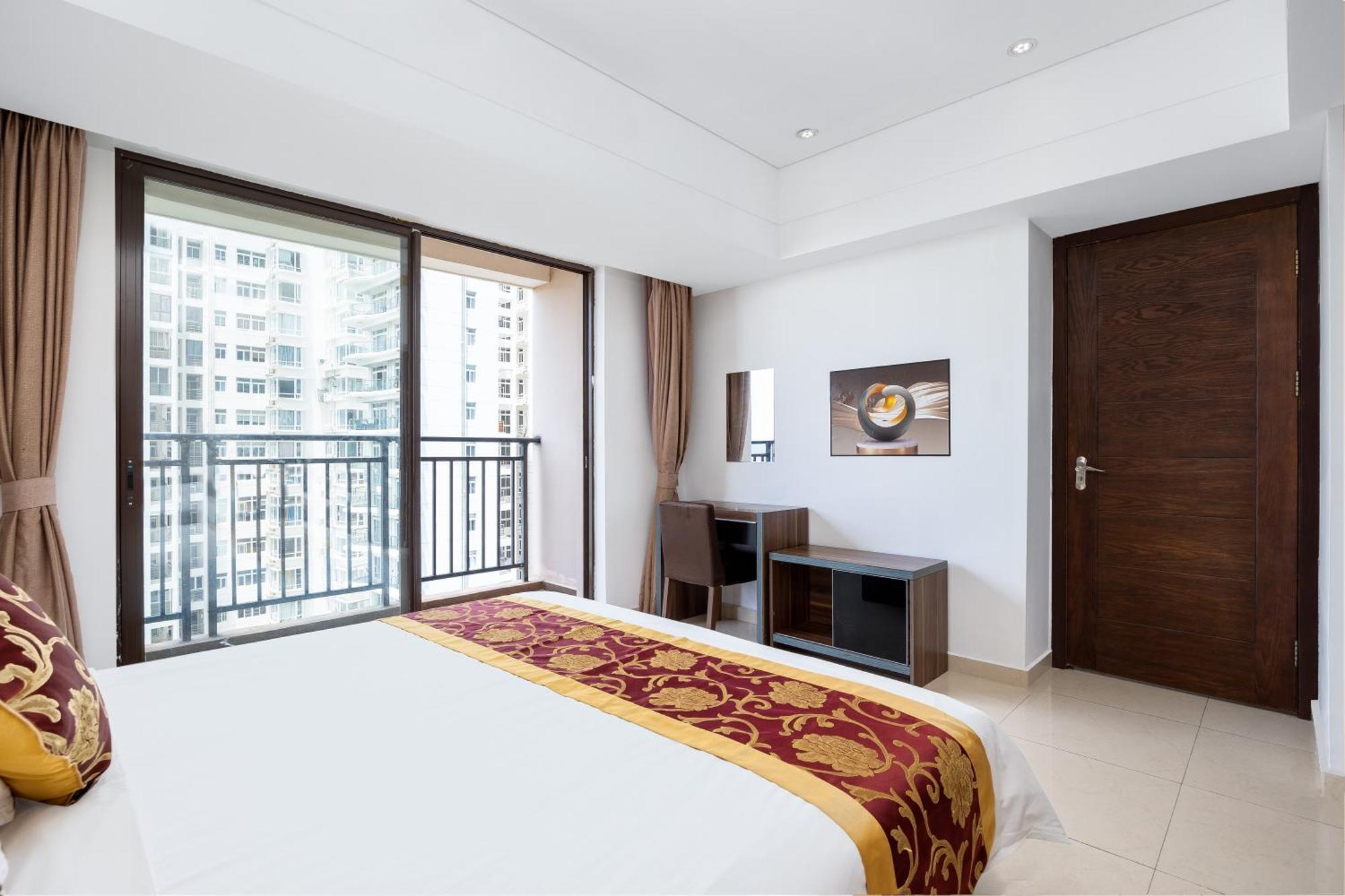 Aparthotel Sanya Sun And Sea Gueshouse Esterno foto