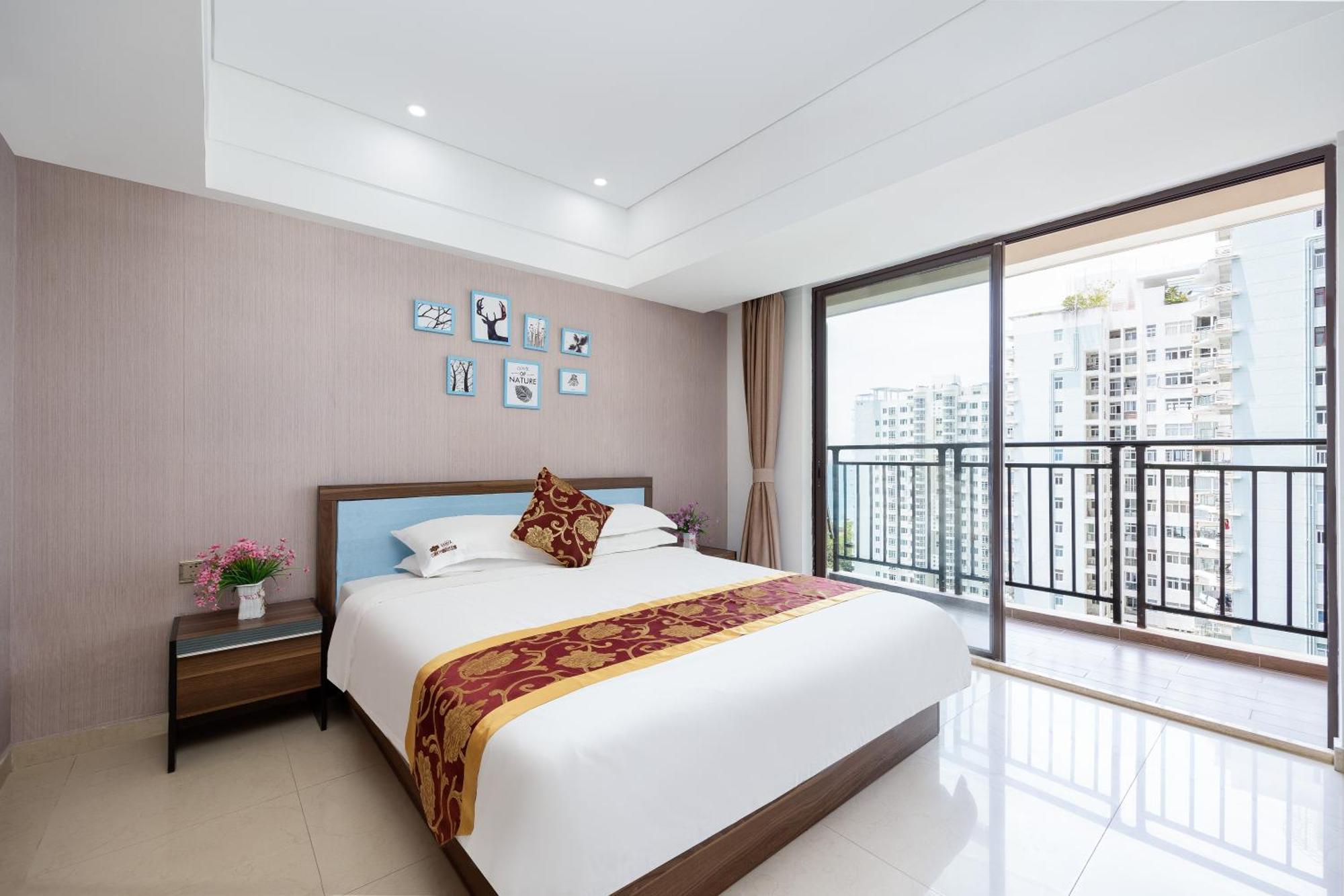 Aparthotel Sanya Sun And Sea Gueshouse Esterno foto