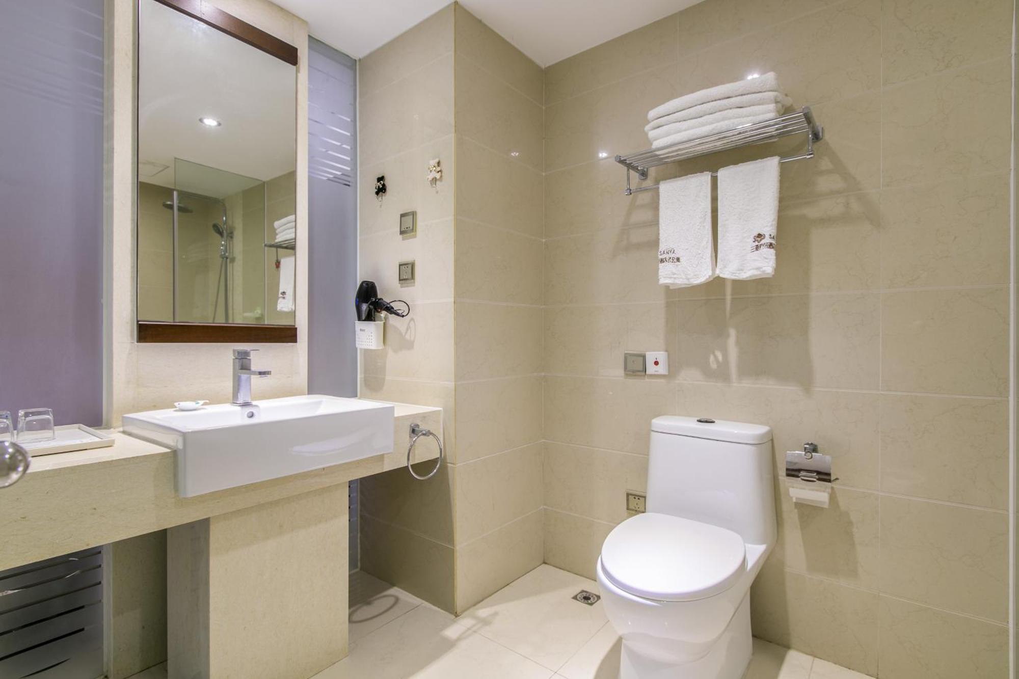 Aparthotel Sanya Sun And Sea Gueshouse Esterno foto