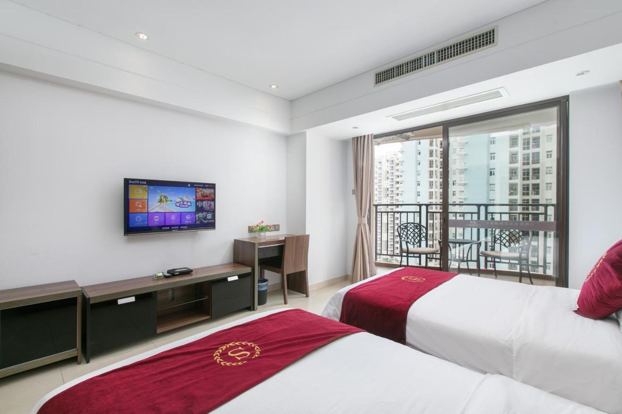 Aparthotel Sanya Sun And Sea Gueshouse Esterno foto