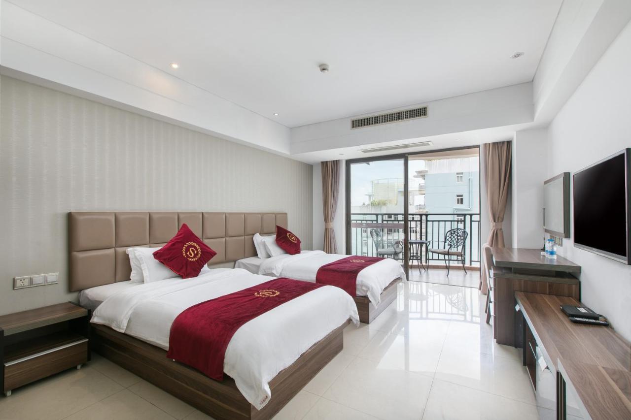Aparthotel Sanya Sun And Sea Gueshouse Esterno foto
