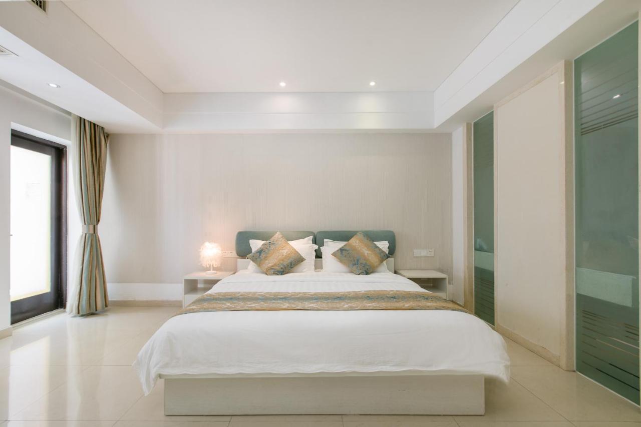 Aparthotel Sanya Sun And Sea Gueshouse Esterno foto