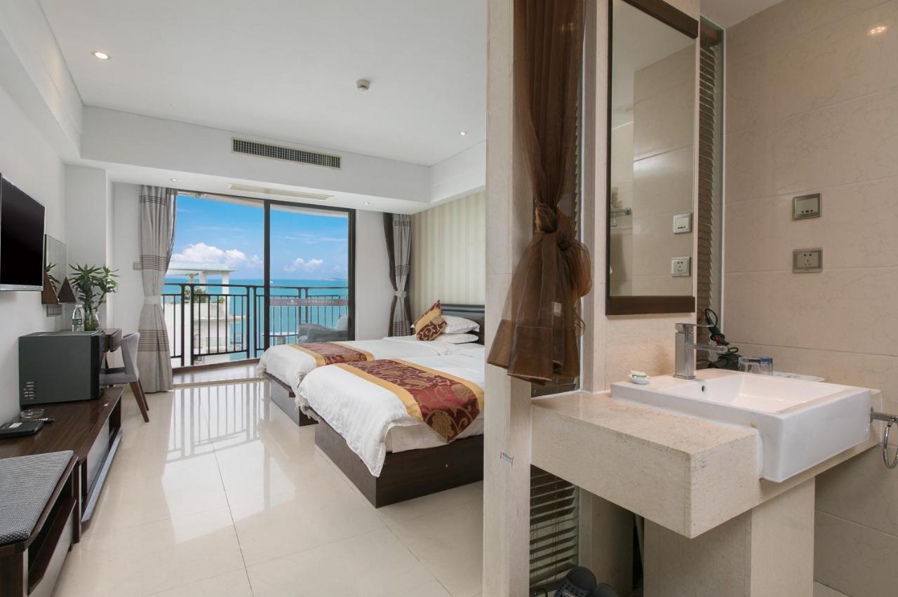 Aparthotel Sanya Sun And Sea Gueshouse Esterno foto