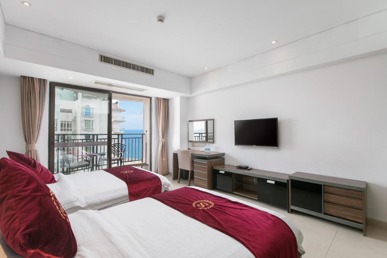 Aparthotel Sanya Sun And Sea Gueshouse Esterno foto
